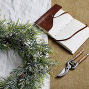 Frosted Pine Wreath With Pinecones